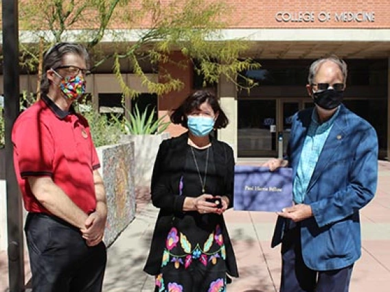 Photo From left: Georg Haubner, Rotary Club of Tucson Sunrise president, Monica Kraft, MD, and Rick Hallick, PhD, the club’s Rotary Foundation director.